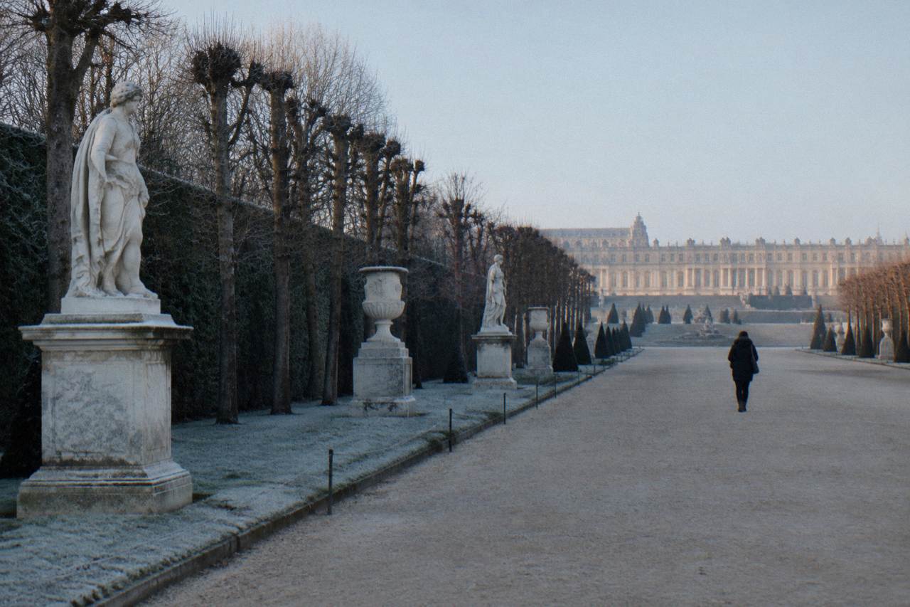 The Versailles palace facade and empty courtyard on a cold winter morning