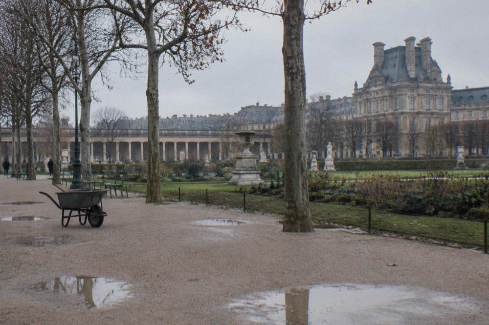 Museum facade in winter with bare trees and a grey sky